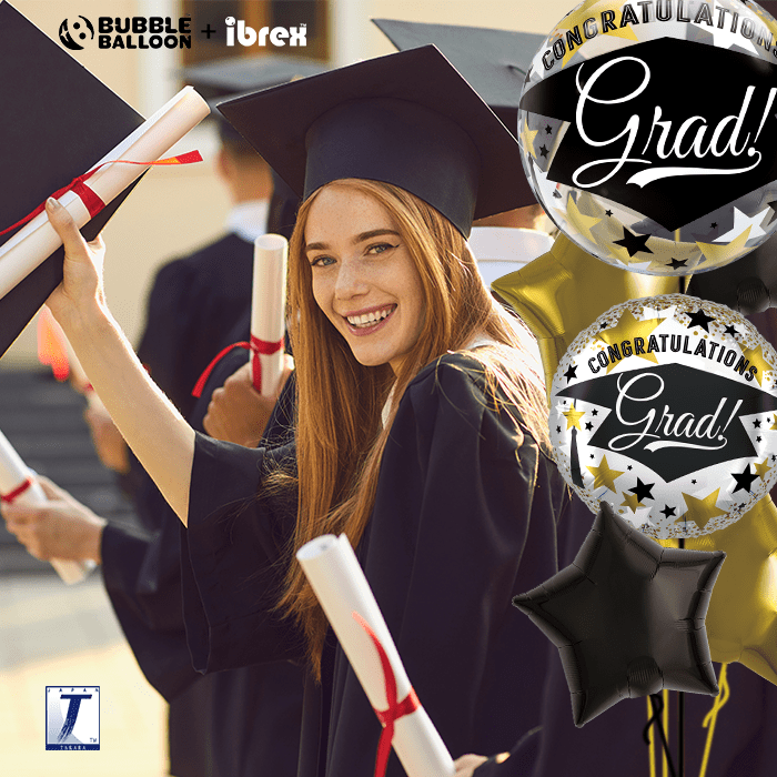a girl with graduation balloons